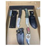 Three skinning knives with sheaths