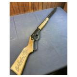 Vintage red Rider BB gun has compression