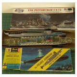Three models in boxes Three models in boxes