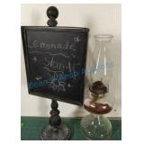 Oil lamp and chalkboard sign Oil lamp and chalkboard sign