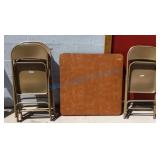 Five folding metal chairs and folding table Five folding metal chairs and folding table