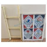Framed quilt piece and decorative ladder Framed quilt piece and decorative ladder