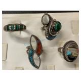 ..Group of four silver Native American rings ..Group of four silver Native American rings