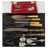 Silverplate spoons, carving sets, more Silverplate spoons, carving sets, more