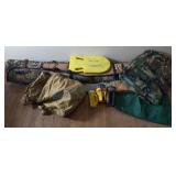 Long gun cases, flashlights, camo blanket Long gun cases, flashlights, camo blanket