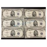 High-grade uncirculated five dollar silver High-grade uncirculated five dollar silver