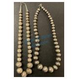 Two strands of sterling Navajo beads Two strands of sterling Navajo beads