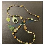 String of carved agate and Jade beads with Jade String of carved agate and Jade beads with Jade