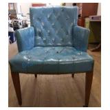 Turquoise leather chair as found Turquoise leather chair as found