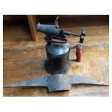 Blow torch and pickax Blow torch and pickax
