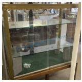 Antique showcase brass frame with wooden base Antique showcase brass frame with wooden base