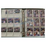 Binder full of baseball cards Binder full of baseball cards