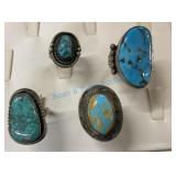 Group of four silver and turquoise rings Group of four silver and turquoise rings