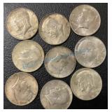 Group of nine 1964 Kennedy half dollars Group of nine 1964 Kennedy half dollars
