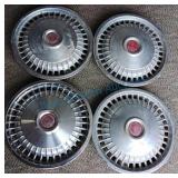 Four matching Pontiac hubcaps Four matching Pontiac hubcaps