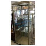Antique tower showcase with nickel frame Antique tower showcase with nickel frame