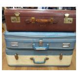 Three vintage suitcases Three vintage suitcases