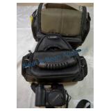 Olympus camera and two bags Olympus camera and two bags