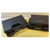 Group of four hard plastic pistol cases Group of four hard plastic pistol cases