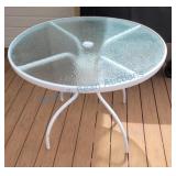 Round glass patio table Round glass patio table