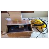 Box of games, vacuum, cordless telephone Box of games, vacuum, cordless telephone