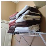 Shelf of Folded Bath Towels