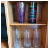 Two Shelves of Glass Vases Two Shelves of Glass Vases