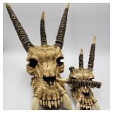 Two Decorative Dragon Skull Sculptures