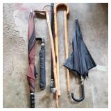 Lot of Umbrellas & Canes in Garage Lot of Umbrellas & Canes in Garage