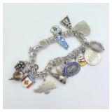 46.7g Sterling World Travel Bracelet & Charms