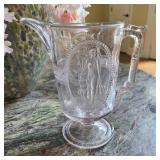 Cupid & Venus Pressed Glass Milk Pitcher Cupid & Venus Pressed Glass Milk Pitcher
