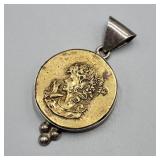 Sterling & Brass Figural Pendant