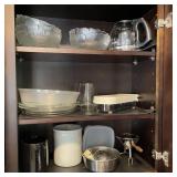 Contents of Kitchen Cabinet by Stove