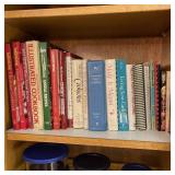 Lot of Cookbooks in Cabinet