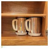2 Stainless Pitchers w/ Plastic Handles Unbranded 2 Stainless Pitchers w/ Plastic Handles Unbranded