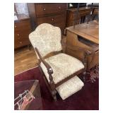 Yellow and green upholstered rocking chair