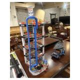 Power tow truck, and parking garage