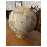 Globe on metal stand