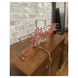 Neon Strohs sign