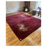 Large red floral design rug