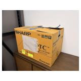 Sharp 	1.5 cu. ft. Over the Counter Microwave