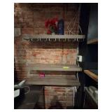 Wall-mounted wooden shelves with brackets