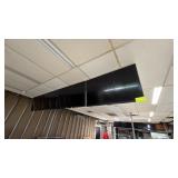 Four Wall-Mounted Flat Screen Monitors