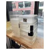 Stacked Transparent Plastic Storage Bins
