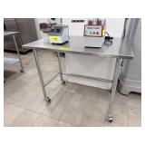 4FT X 30 INCH SS TABLE OPEN BASE ON CASTER