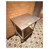 SS TABLE ON CASTERS