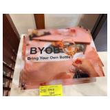 Stack of BYOB Acrylic Signs