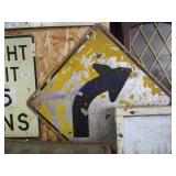 CURVED ARROW SIGN