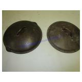2 CAST IRON LIDS