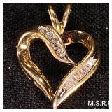 1.6 DWT 10 KT Gold Heart Pendant w/ Diamond 1.6 DWT 10 KT Gold Heart Pendant w/ Diamond